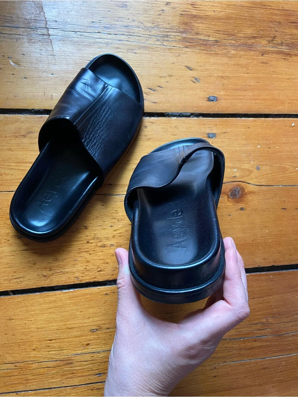Aeyde black nappa leather slides